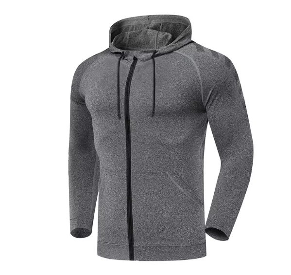 صورة مجموعة ألعاب أنيقة تتميز بسترة سحاب وسروال مطابقة ، مصممة للتدريبات الرياضية وتدريبات الصالة الرياضية.